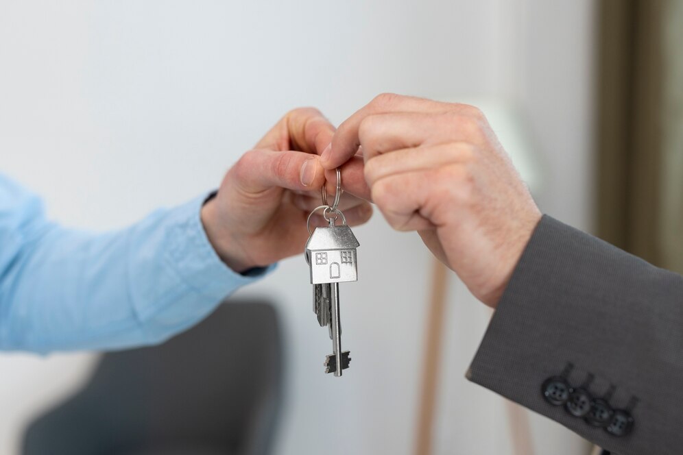 keys-being-held-by-real-estate-agent-buyer_23-2150164718