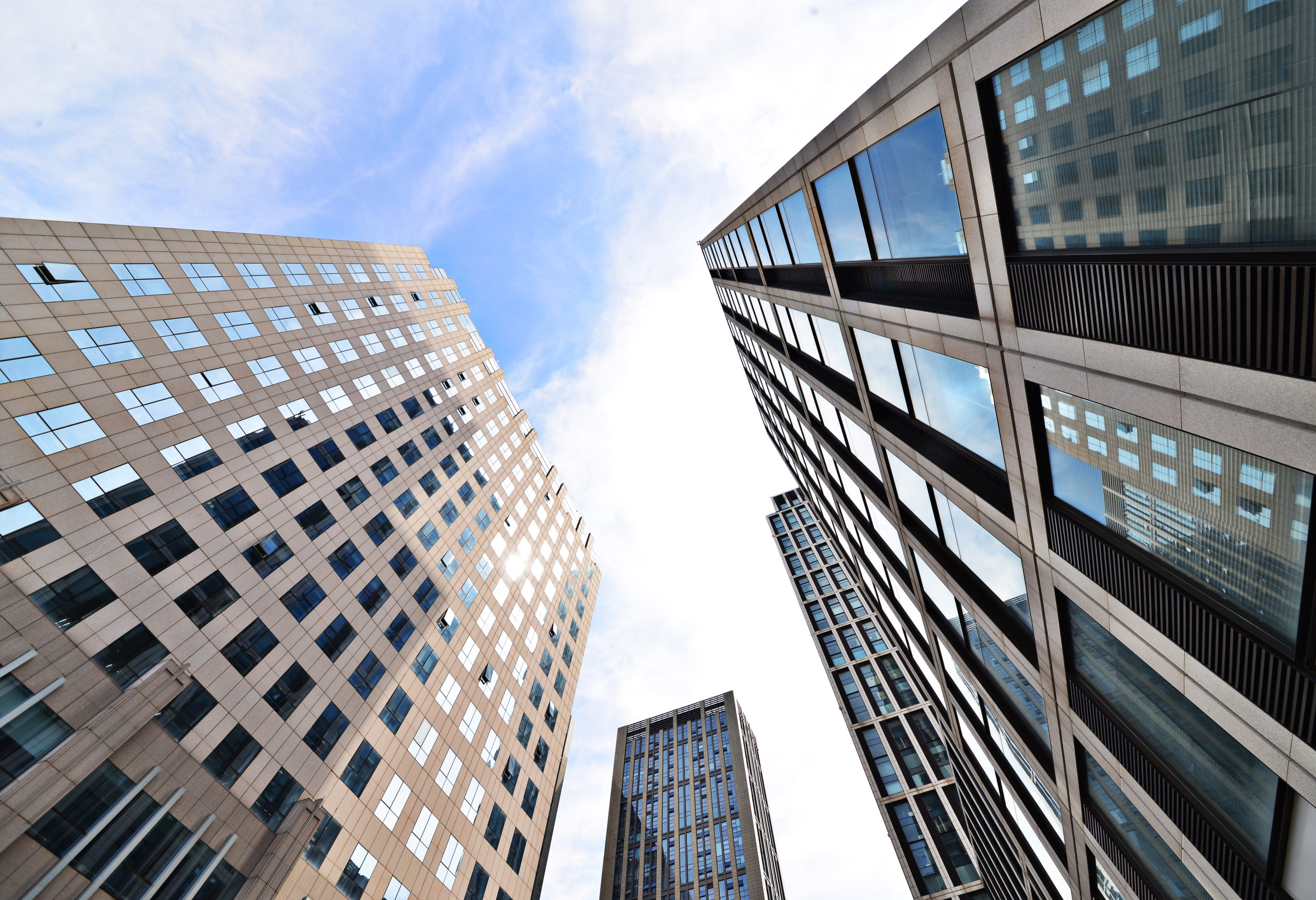 Looking up at business buildings in downtown New York, USA